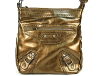 Messenger Bag made of Polyurethane material has top zipper closure with adjustable straps & also has a front zipper pocket. Accentuated with belt buckle straps and diamond studs.