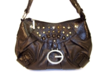 Ostrich embossed handbag made of polyurethane material has top zipper closure with diamond studs on the front. It is accentuated with belt buckle straps on each side of the purse and has a single strap.