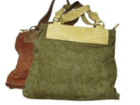 Jacquard fabric handbag made with double shoulder straps and a top zipper closure. 
