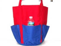 Beach bag made of canvas assembled with bag compartments.