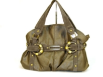 Glossy PVC fashion handbag with straps accent in suede fabric. Double shoulder straps with top zipper closure. 