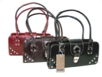 Leather Look PU Handbag has a thin double handle, a top zipper closure and strap with push lock closure. Bag has studded details.