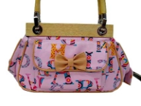 Fashionable shoudler bag has a multi color letter pattern, a top zipper closure, a double handle, and an outside pocket with bow detail. Made of faux leather.