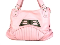 Designer Inspired Shoulder Bag with accentuating metal design. Bag has a zipper closure and a double handle. Made of polyurethane.