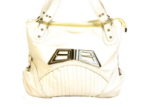 Designer Inspired Shoulder Bag with accentuating metal design. Bag has a zipper closure and a double handle. Made of polyurethane.