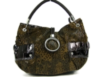 Animal print Fur fashion handbag embellished with a top zipper closure with a hanging bracelet handle and a single shoulder strap.  Outter bold compartments also accentuate this bag. 
