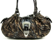 PVC animal print fashion handbag assembled with a front flap along with hardware and studs. Bag has side and inside pocket compartments along with a top zipper closure and double shoulder straps. 