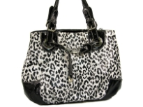 Leopard printed tote bag has a double handle, a top zipper closure and a drawstring detail. Made of PVC.