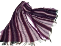 Purple colored viscose scarf with striped pattern in white color. Little eyelash fringes along the length of scarf and threads like at the edges. Imported.