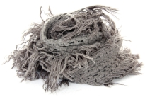 This fringed style is sure to be a favorite. This 100% acrylic fringe scarf has a lightweight knit design that you can drape and wear in numerous ways. Long fringes on the edges makes it more funky. Imported.