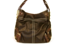 Two toned fashion tote bag with trimming has a top zipper closure and a single strap. Made of PVC.