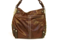 Two toned fashion tote bag with trimming has a top zipper closure and a single strap. Made of PVC.