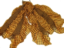 This checkered print mustard & black 100% polyester scarf can be a perfect accessory all year round. The scarf is stretched in the middle with a striped pattern & gives a ruffled look. Imported.