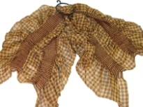 This checkered print 100% polyester scarf in light brown can be a perfect accessory all year round. The scarf is stretched in the middle with a striped pattern & gives a ruffled look. Imported.
