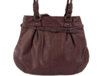 Fashion tote bag has a top zipper closure, a double handle and thin belt detail. Made of faux leather.