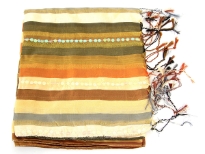 Stripes in shades of peach, olive & bronze colors galore over this shiny polyester scarf which also has lines of translucent sequins towards its ends. Thin fringes on its ends completes this 100% polyester scarf. Hand wash. Imported.