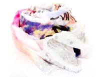 This white colored 100% polyester scarf has abstract print in water color shades  with "dance with me" phrase at a few places. Four lines of sequins at its ends & eyelash fringe along the length completes this lightweight & soft to use scarf. Imported. Hand wash.