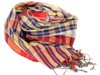 Navy colored plaids print covers this shiny gold colored 100% polyester scarf. Red border along the vertical edge of scarf & thin twisted fringes at the edges. Imported. Hand wash.