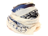 Beige colored scarf has an abstract print in brown & navy colors with feathers in the middle of scarf and chains print along its ends. Eyelash fringe along the length of scarf gives little edge to this lightweight & soft to use scarf. 100% polyester. Imported. Hand wash. 