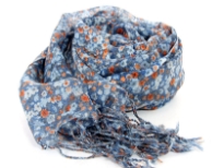Light blue & orange colored miniature flowers blooms over this 100% wool weave of blue colored scarf finished with long twisted fringe at its ends. Imported. Dry clean only. 
