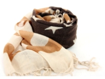 Beige colored wool scarf with mustard horizontal stripes and star print over coffee colored middle of the scarf. Imported. Dry clean only.