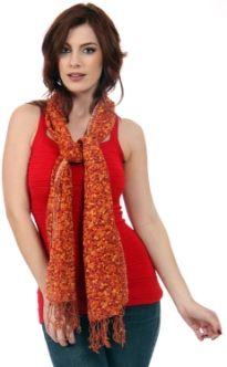 A garden of miniature red & yellow flowers blooms on this 100% wool weave of warm colored scarf finished with long twisted fringe at its ends. Imported. Dry clean only.