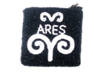 Hand Beaded Coin Purse. Top zipper closing.