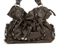 Fashion Handbag has a drawstring closure, a double handle and outside pockets. Made of PVC.
