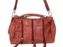 Fashion handbag with short double handle, detachable shoulder strap, top zipper closure, patchwork pattern and zipper details. Made of PU (polyurethane).