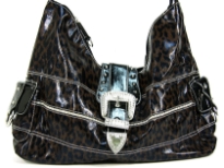 This bag is made of polyurethane material. It has a belt buckle metallic opening and a top zipper closure. It is a single strap bag with animal print pattern.