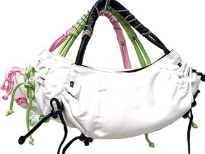 Designer Inspired Handbag with drawstring detail along the sides, has a top zipper closure and a single strap. Made of faux leather.