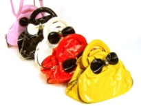 Designer Inspired Handbag with bow detail has a double handle and a detachable single strap. Bag has a checkered pattern design. Made of PU (polyurethane).