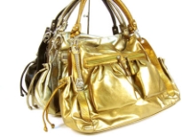 Designer Inspired Metallic Shoulder Bag with top zipper closure, double shoulder straps, two side open pockets with drawstring closure & two front zipper pockets. Chain accents in the front. Made of PU (polyurethane).