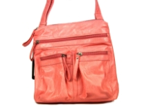 Fashion bag has multiple exterior pockets with zipper closure. Single strap. Made of PVC. 