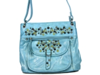 Studded shoulder bag has a top zipper closure, outside pockets and an adjustable single strap. Made of faux leather.