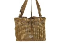 Designer Inspired Tote Shoulder Bag with animal print pattern and a double handle. Bag has a drawstring closure. Made of PVC.