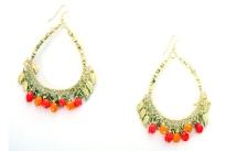 Golden earrings with red beads