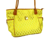 Fleur De Liz Licensed Jacquard Handbag. This spacious broad bag with two side pockets with button closure has leather trim bordering the bag & has double handle. 