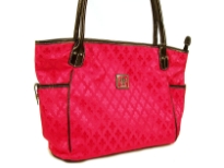 Fleur De Liz Licensed Jacquard Handbag. This spacious broad bag with two side pockets with button closure has leather trim bordering the bag & has double handle. 