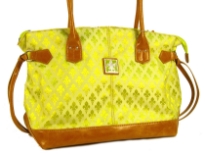 Fleur De Liz Licensed Jacquard Handbag with hanging strands on the sides. The base of the bag & double handle is in leather with zipper closure on the bag.