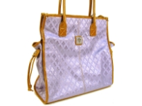 Fleur De Liz Licensed Jacquard Handbag. Double Handle & top zipper closure in leather. Two side pockets outside the bag with hanging leather strands & outside zipper pocket. Leather trim borders the bag.