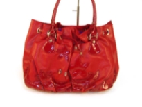 Designer Inspired Handbag with drawstring closure & double handle has flowered applique details and ruched at bottom. Made of PU (polyurethane).