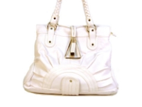 Designer Inspired Shoulder Bag has a top zipper closure and a double braided handle. Bag has a sunrise detail in the bottom. Bag is made of PU (polyurethane).