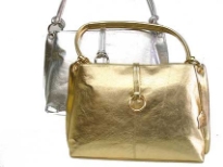 Shiny Genuine Leather Handbag with Shoulder Handle & clasp over the zipper closure.