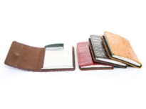 Alligator embossed business card holder. Magnetic snap closing.