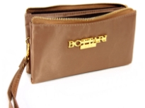 Nylon cosmetic wrist-let. Top zipper closing. Three separate compartments.