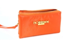 Nylon cosmetic wrist-let. Top zipper closing. Three separate compartments.