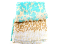 Add a pop of neon to your outfit with this lightweight scarf in 100% polyester. This semi sheer scarf features an allover leopard print in neon color with brown print towards the ends of the scarf. Hand wash. Imported.