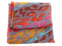 Semi-sheer grey polyester scarf with multi colored abstract print. Big size of the scarf makes it possible to be used as a shawl, wrap or scarf around the neck. Imported. Hand wash.