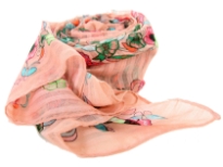 A garden of multi colored floral print blooms over this finely made 100% polyester scarf in peach pink which is lightweight to use. It can be used all year around with any kind of outfit. Imported. Hand wash.